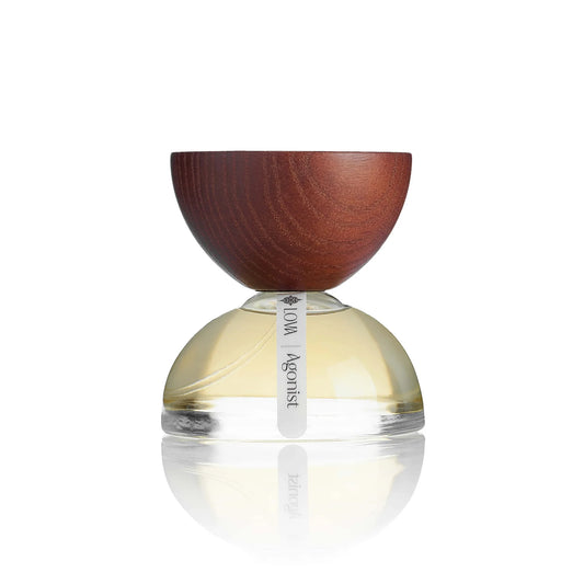 Agonist by LOVA niche perfume bottle with wooden cap and transparent base on white background
