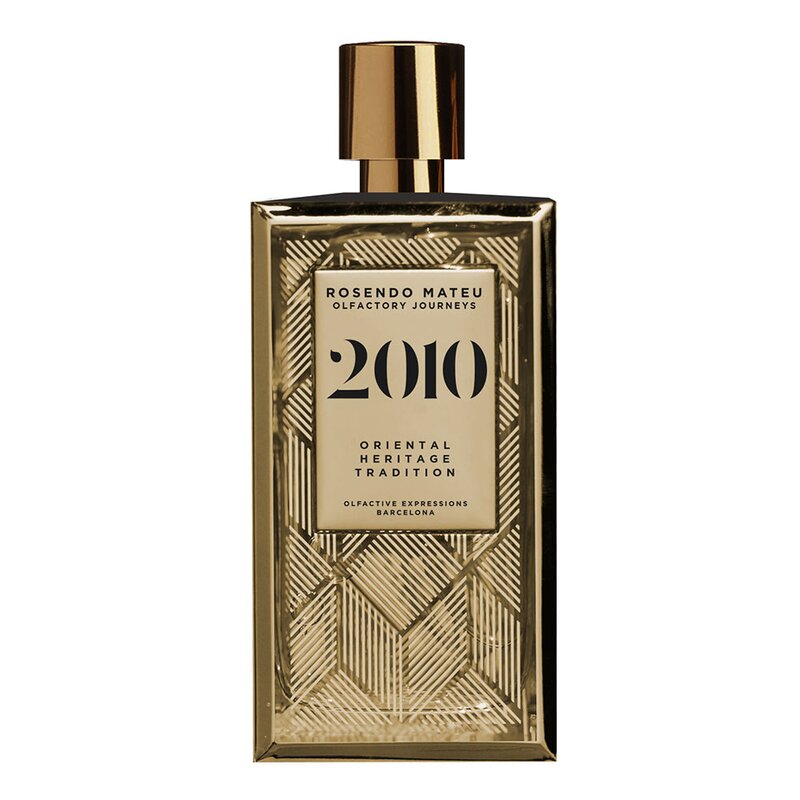 Rosendo Mateu 2010 Olfactory Journeys perfume bottle with gold geometric glass design and metallic cap.