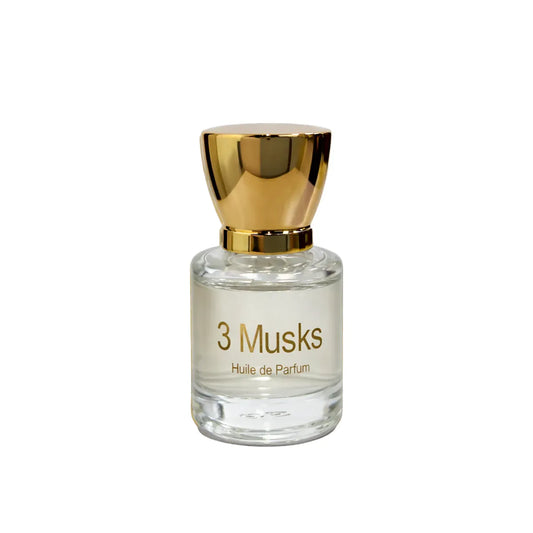 3 Musks huile de parfum bottle with clear liquid and gold cap on clean white background