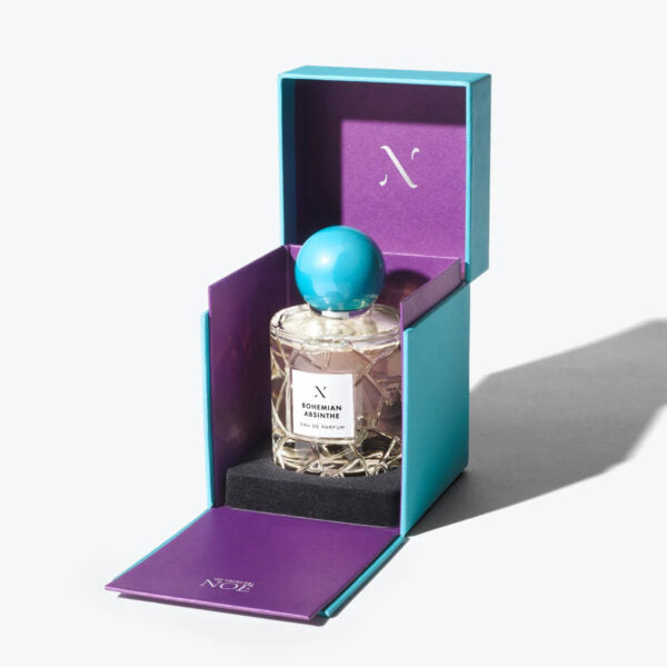 Bohemian Absinthe Eau de Parfum by Les Sœurs de Noé luxury perfume bottle in turquoise and purple gift box packaging