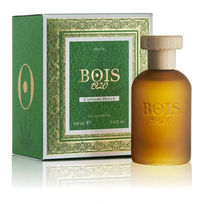 Bois 1920 Cannabis Dolce Eau de Parfum bottle with frosted amber glass and wooden cap displayed beside its green luxury fragrance box.