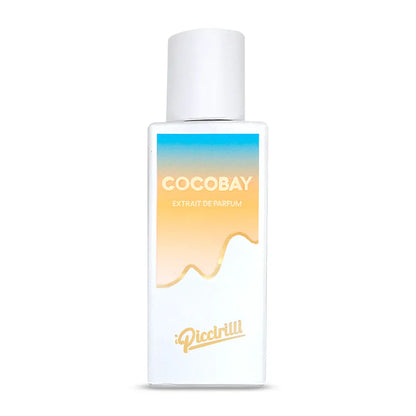 Cocobay Extrait de Parfum by iPiccirilli fragrance bottle with white cap and gradient sunset label design