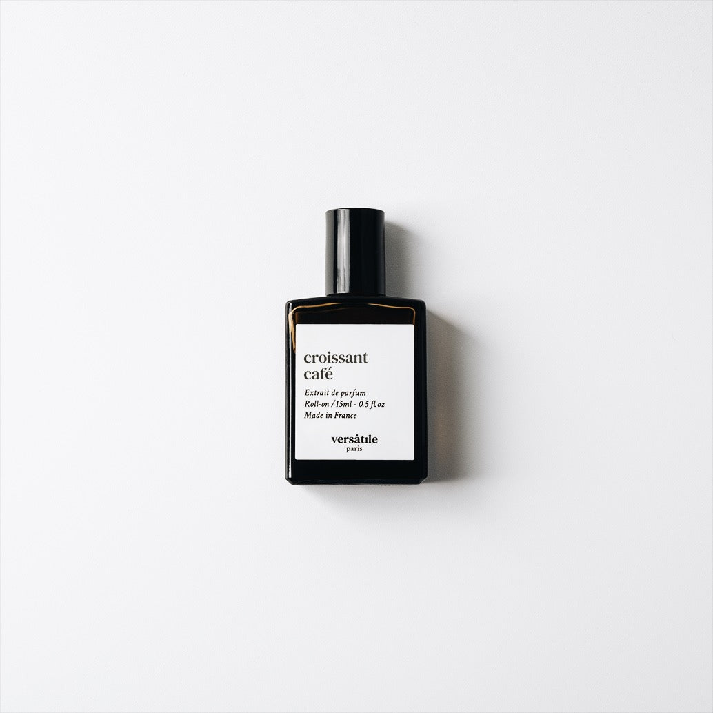 Versatile Paris Croissant Café extrait de parfum roll-on bottle in dark glass with minimalist white label