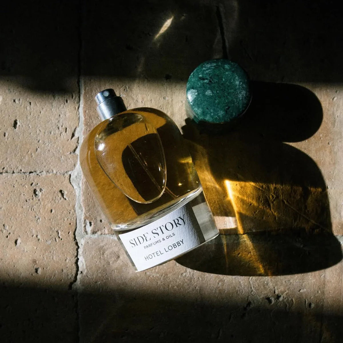 Hotel Lobby by Side Story – A woody-green fragrance available at Hallburg.ae.