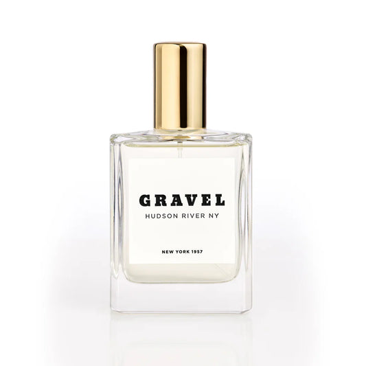 Hudson River NY by GRAVEL niche perfume bottle with golden cap on white background
