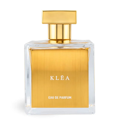 Gold and clear perfume bottle labeled 'KLEÓA Eau de Parfum' on a white background