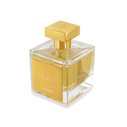 KLEA Eau de Parfum by House of Brandt luxury square glass perfume bottle with gold cap and warm amber fragrance liquid