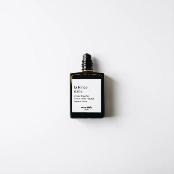 Versatile Paris La Foncedalle roll-on extrait de parfum bottle on minimal white background