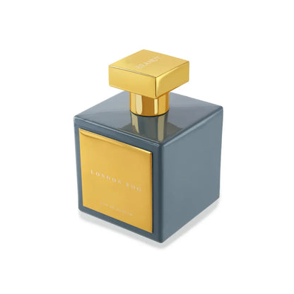 London Fog Eau de Parfum by House of Brandt blue square perfume bottle with gold cap and metallic label angled luxury fragrance product shot
