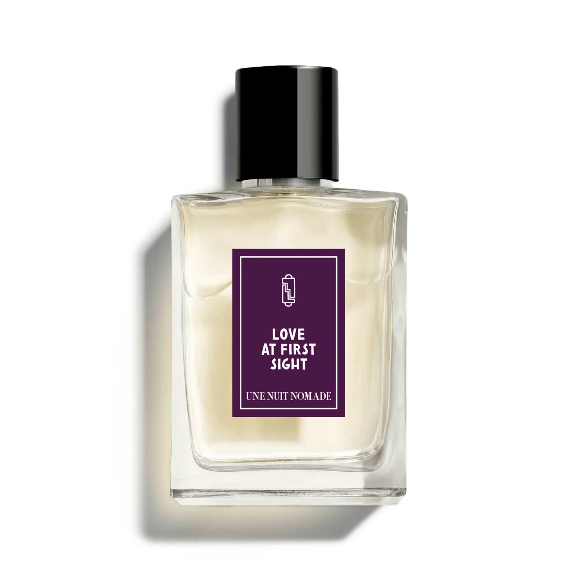 Une Nuit Nomade Love At First Sight Eau de Parfum in minimalist clear glass bottle, elegant niche fragrance with soft floral, musky, and romantic scent notes