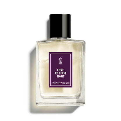 Une Nuit Nomade Love At First Sight Eau de Parfum in minimalist clear glass bottle, elegant niche fragrance with soft floral, musky, and romantic scent notes