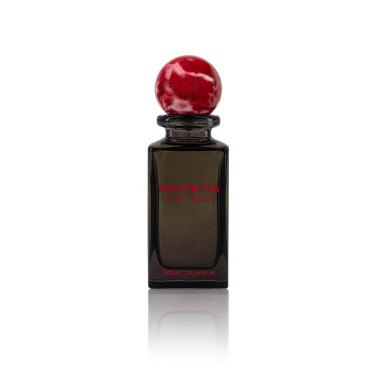 Reinvented Lucid Dream Extrait de Parfum bottle with red marble cap luxury niche fragrance