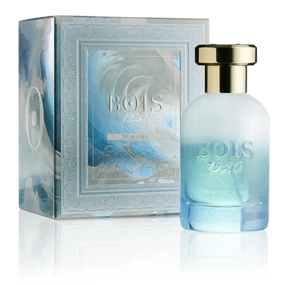 Bois 1920 Marasma Extrait de Parfum bottle with frosted blue gradient glass and gold cap beside decorative perfume box