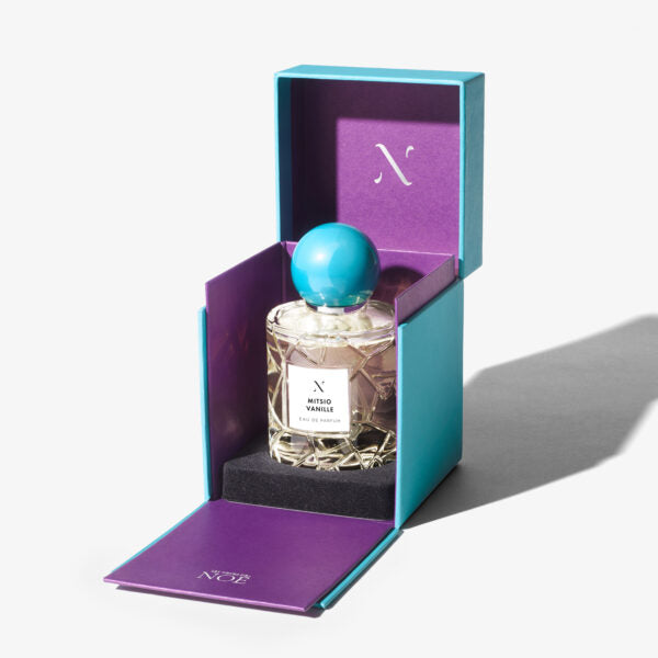 Mitsio Vanille Eau de Parfum by Les Sœurs de Noé luxury fragrance bottle in turquoise and purple gift box packaging