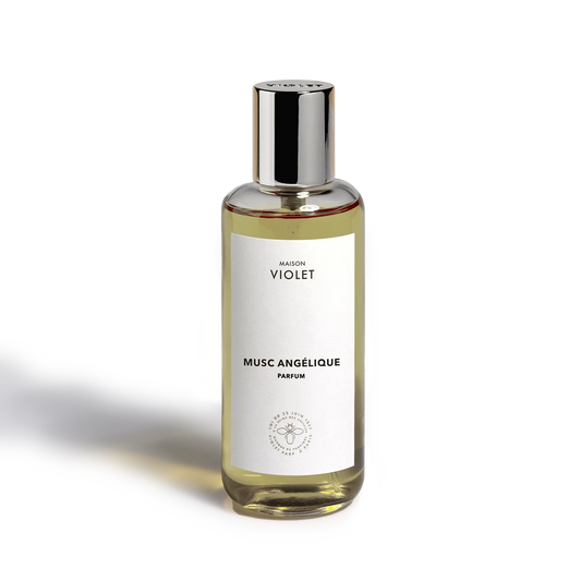 Musc Angélique by Maison Violet perfume bottle with silver cap on white background
