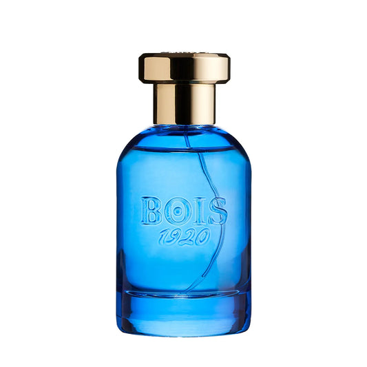 Bois 1920 Oltremare Eau de Parfum vibrant blue glass bottle with embossed logo and polished gold cap on a clean white background.