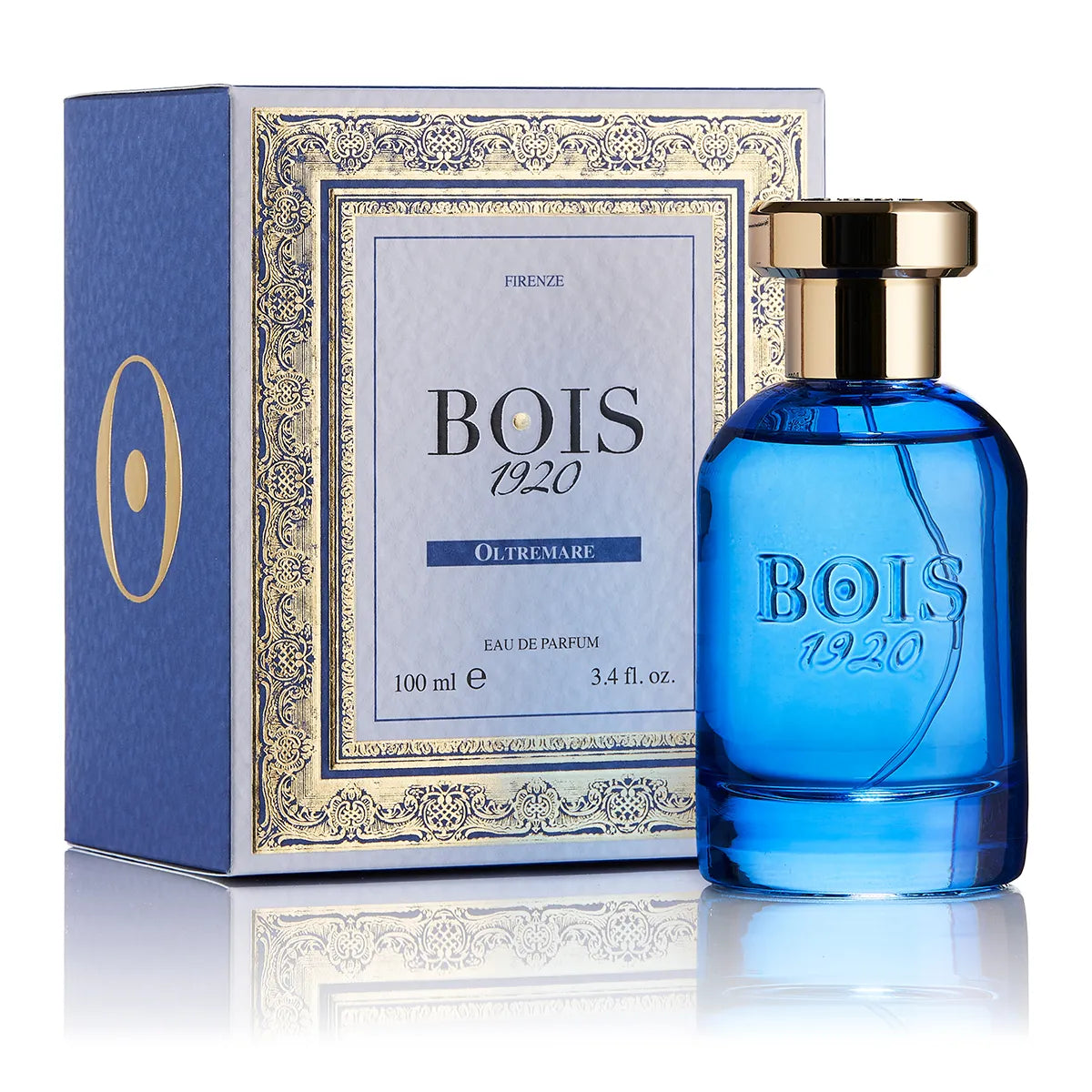 Bois 1920 Oltremare Eau de Parfum blue glass bottle with gold cap displayed beside its elegant blue and gold decorative fragrance box.