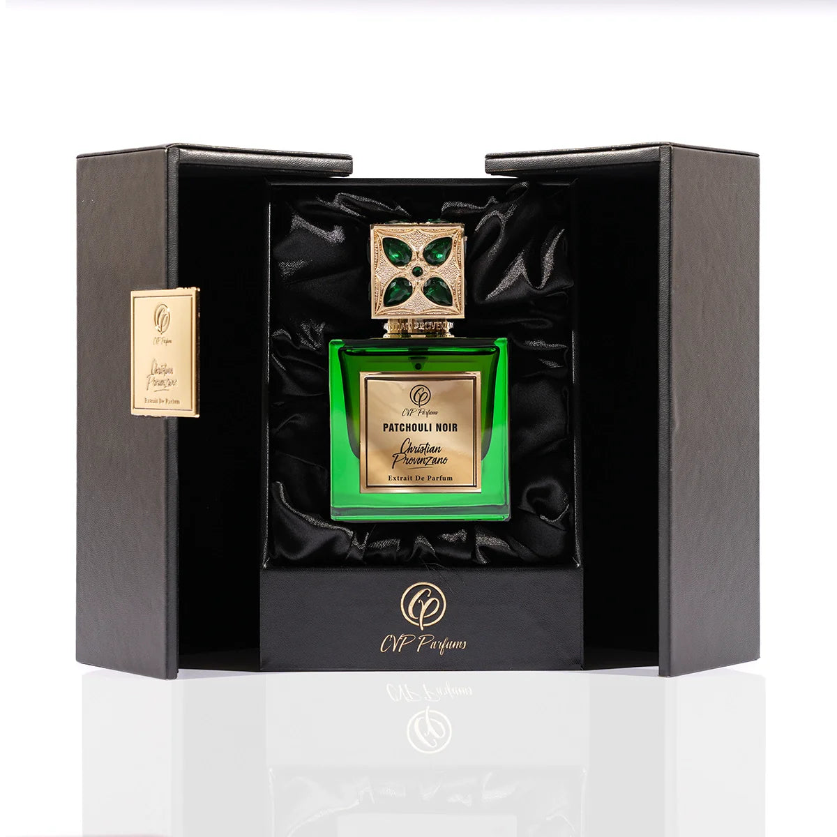 Christian Provenzano Patchouli Noir Extrait de Parfum displayed in a premium black box with satin interior and emerald green bottle