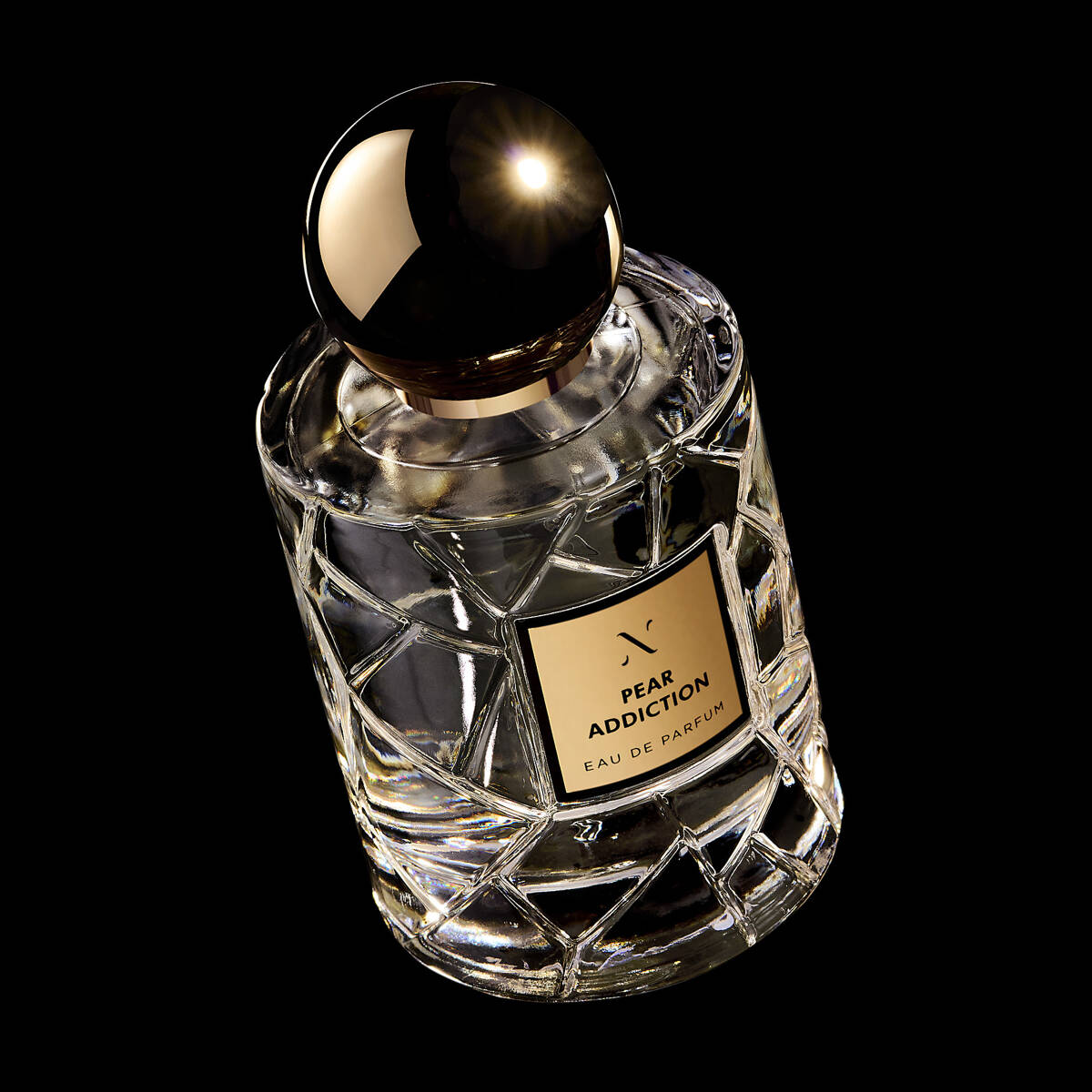 Pear Addiction Eau de Parfum by Les Sœurs de Noé luxury glass perfume bottle with gold cap on black background product shot