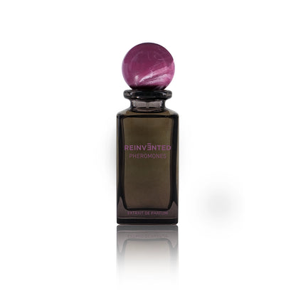 Reinvented Pheromones Extrait de Parfum bottle with purple marble cap luxury niche fragrance