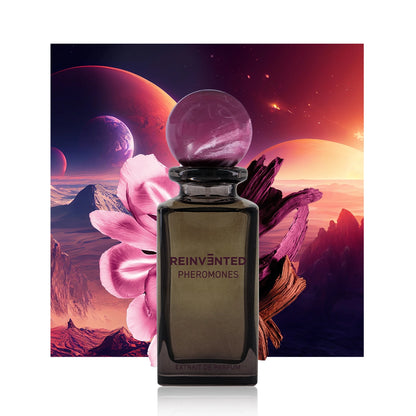 Reinvented Pheromones Extrait de Parfum artistic product image with purple marble cap, pink flower and cosmic landscape background luxury niche fragrance