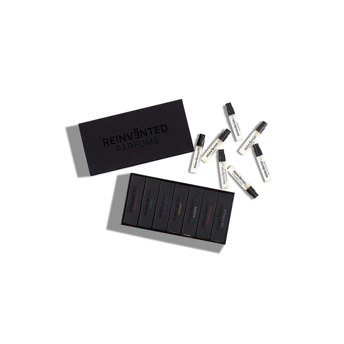 Reinvented Parfums discovery set luxury niche fragrance sample kit with spray vials and black presentation box