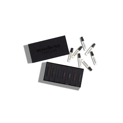 Reinvented Parfums discovery set luxury niche fragrance sample kit with spray vials and black presentation box