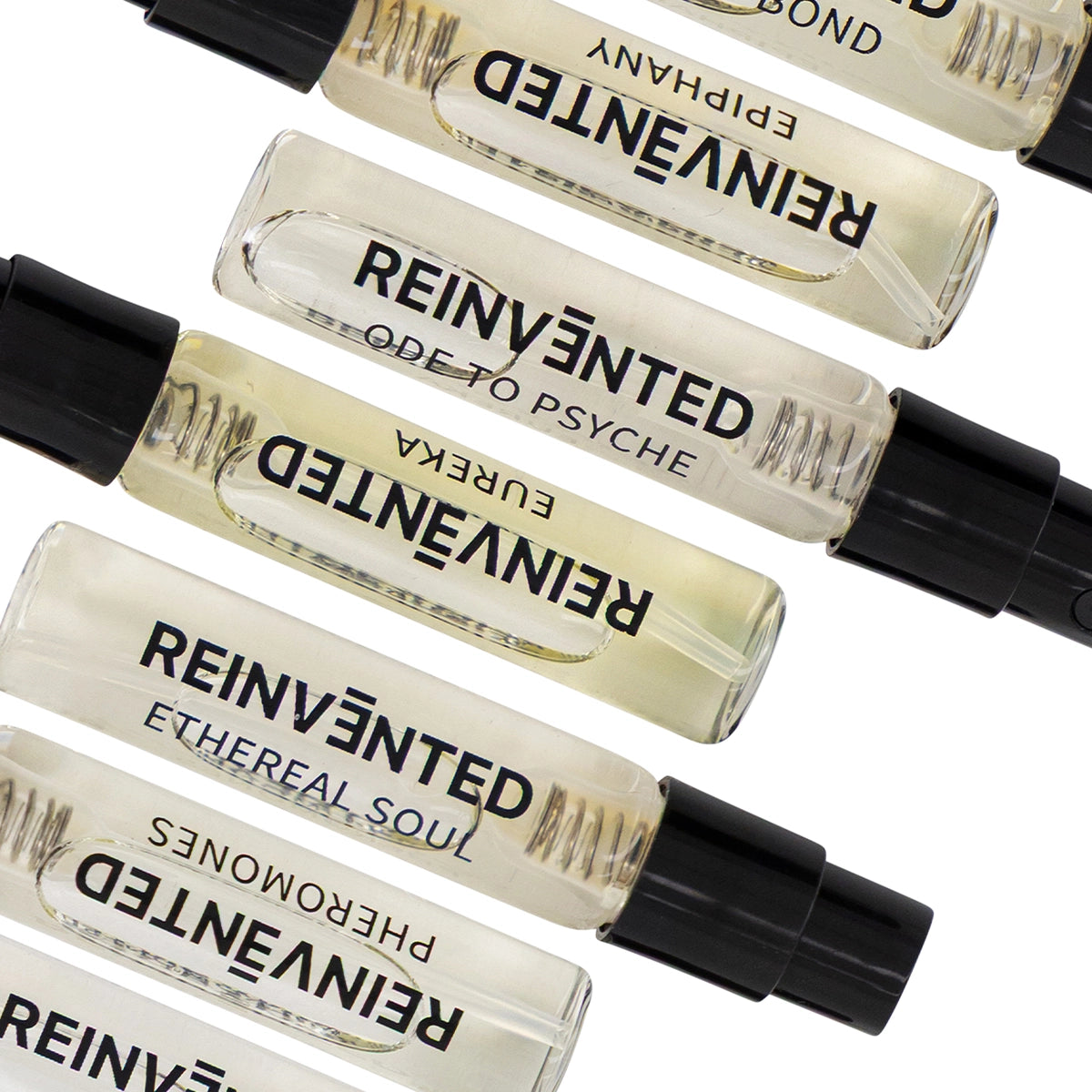 Reinvented Parfums discovery set sample spray vials including Ode to Psyche, Ethereal Soul and Pheromones niche fragrance collection