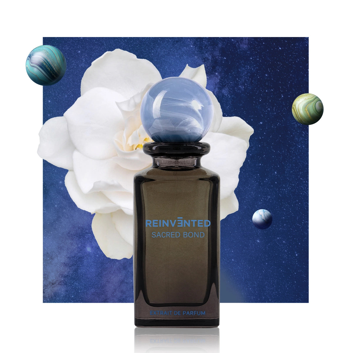 Reinvented Sacred Bond Extrait de Parfum artistic product image with blue marble cap, white flower and cosmic background luxury niche fragrance