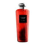 Red perfume bottle with silver cap on a white background