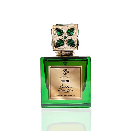 Christian Provenzano Spezia Extrait de Parfum green glass bottle with gold label and ornate cap featuring emerald gemstone accents