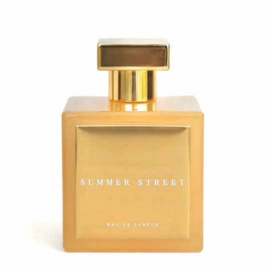 Summer Street Eau de Parfum by House of Brandt elegant matte amber perfume bottle with gold cap