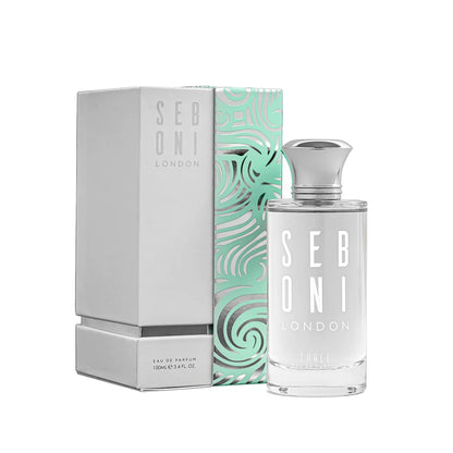 Seboni London Three Eau de Parfum bottle with its silver box and mint green patterned packaging displayed on a clean white background