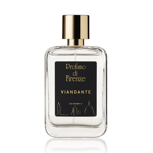Perfume bottle with gold cap and black label on a white background